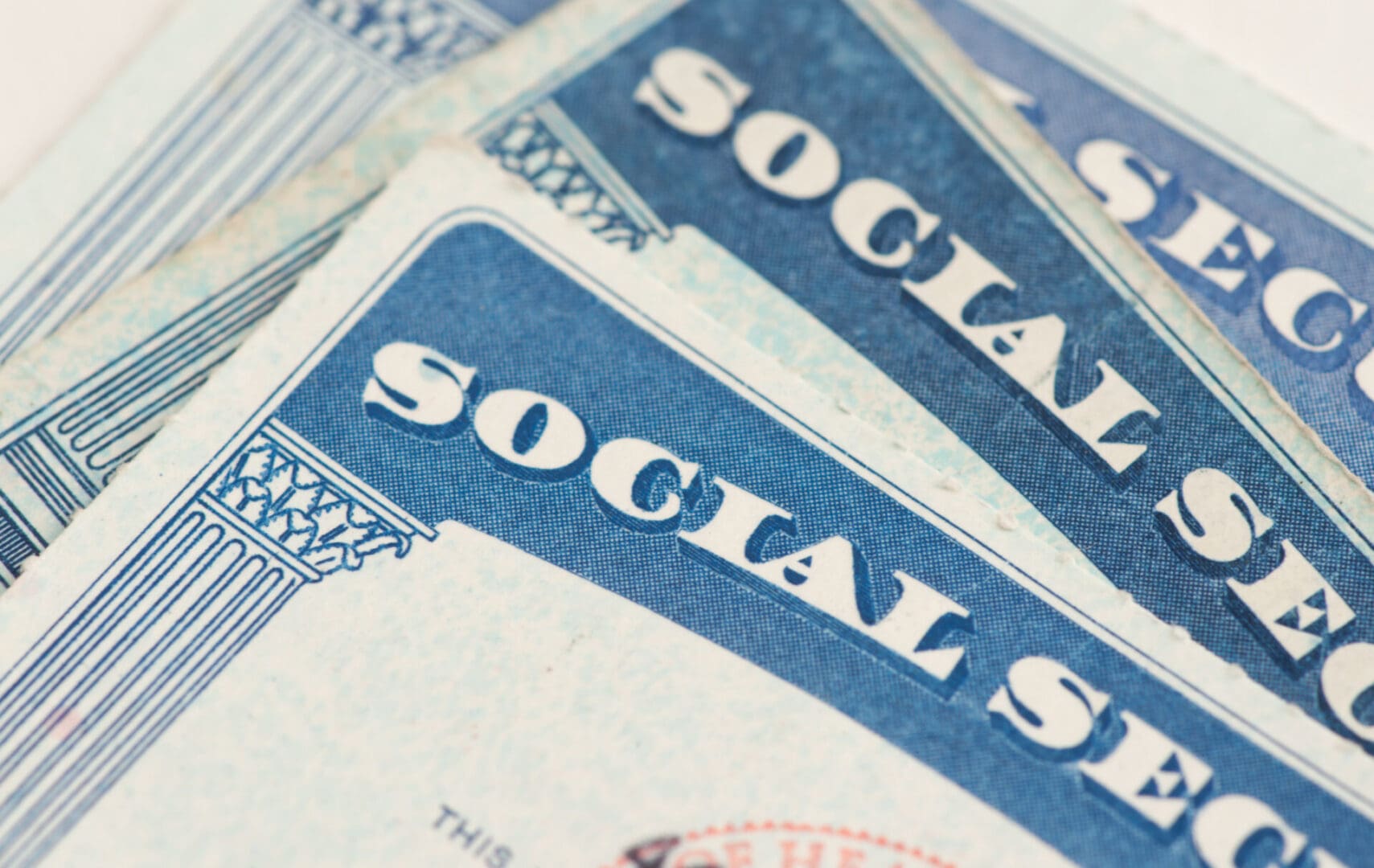 A close up of social security cards