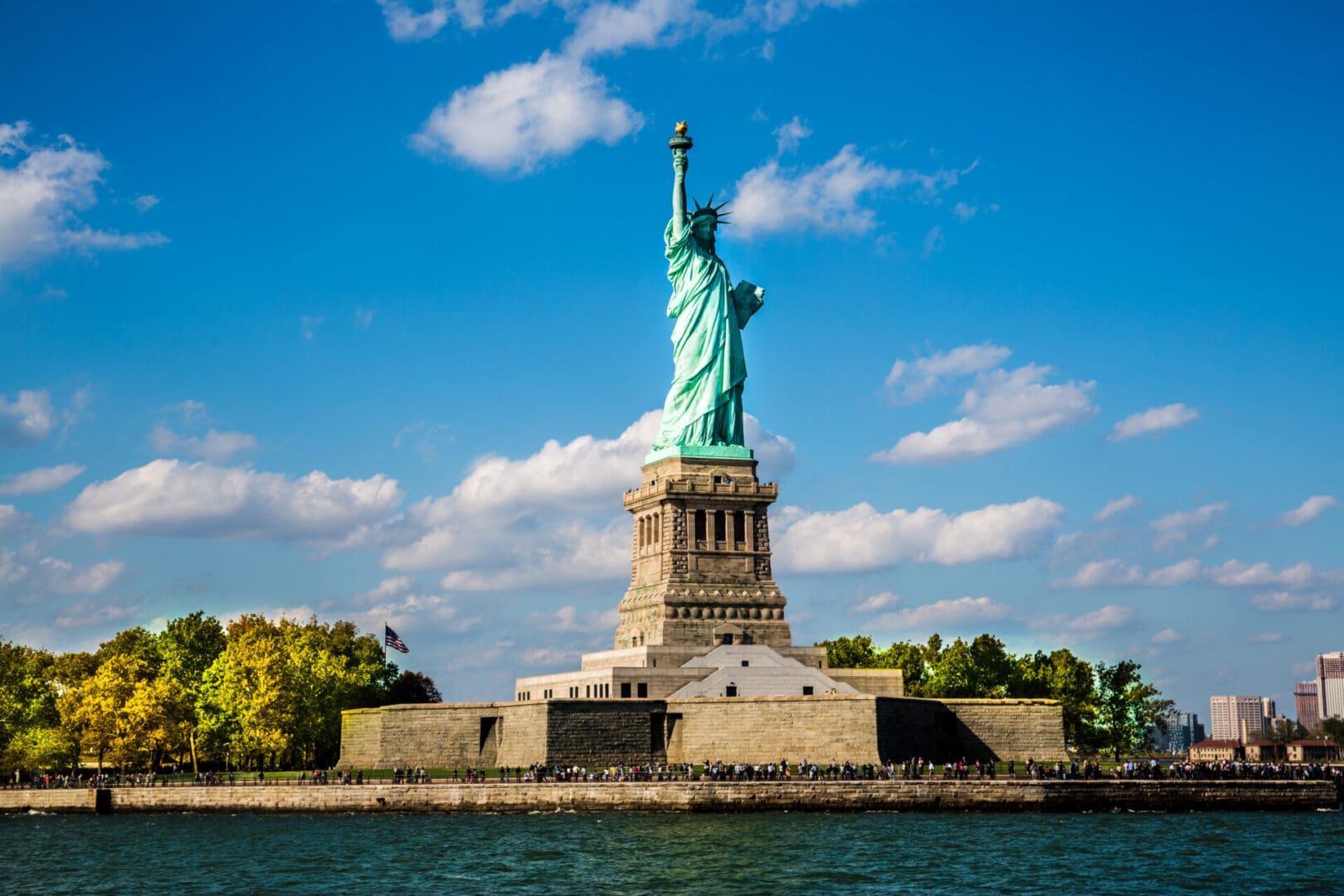A statue of liberty on the water
